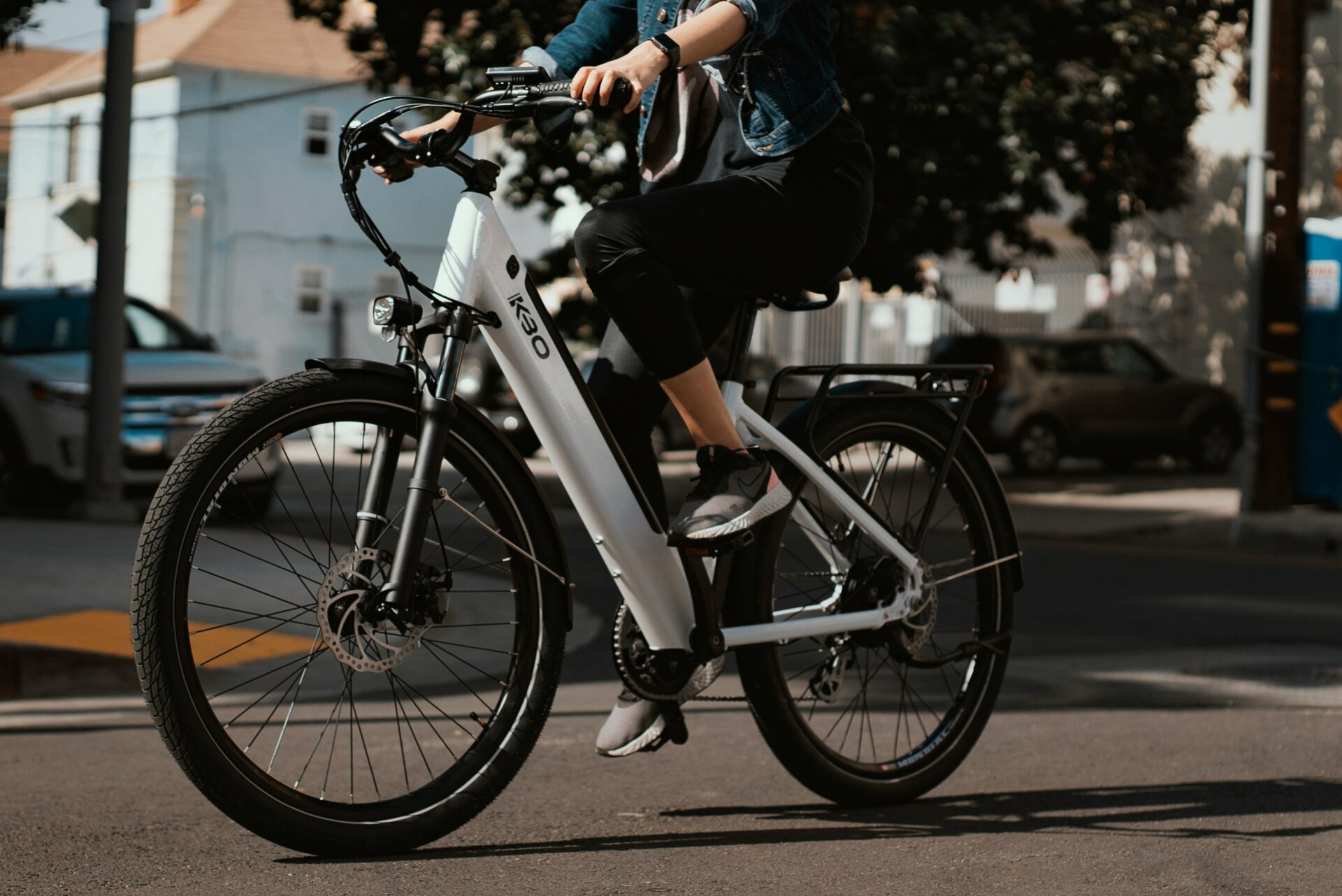 an e-bike being ridden on a street